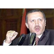 BAŞBAKAN DAN  İFTİRA  DAVASI