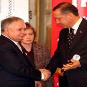 ERDOĞAN DAN İMA LI BAŞSAĞLIĞI!